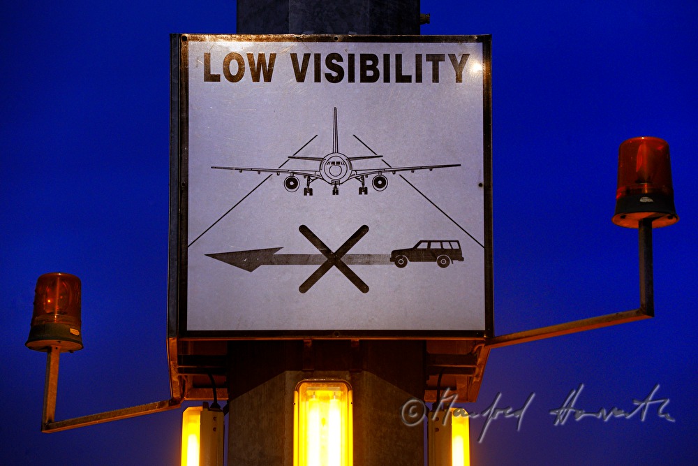 signboard for cars driving on the airfield