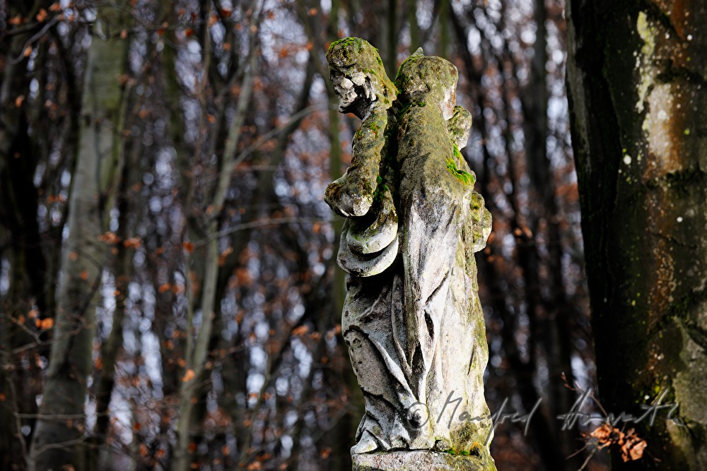 christian wayside sculpture on the water parting