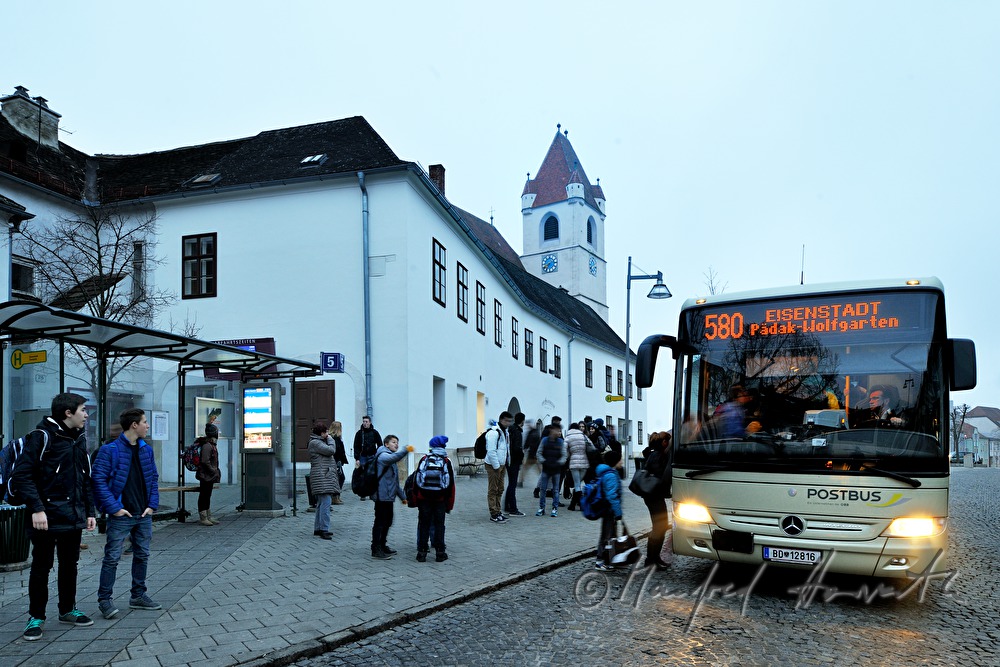 scholars waiting for the school bus