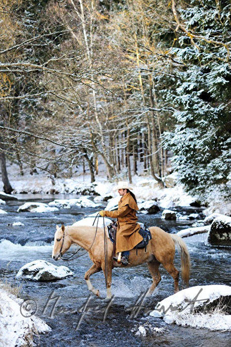 western rider crosses the river Zwettl