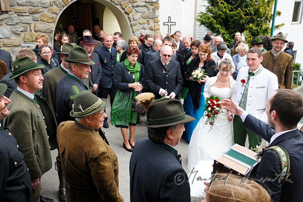 bridal couple in front of the church after the wedding ceremony