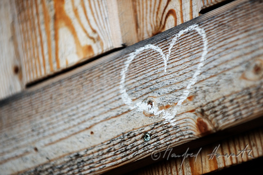 heart sketched over the entrance of the alpine hut