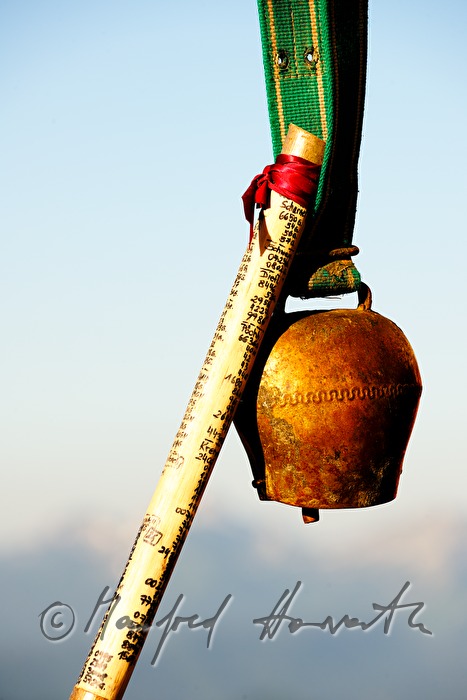 cowbell and hiking pole of the herdswoman