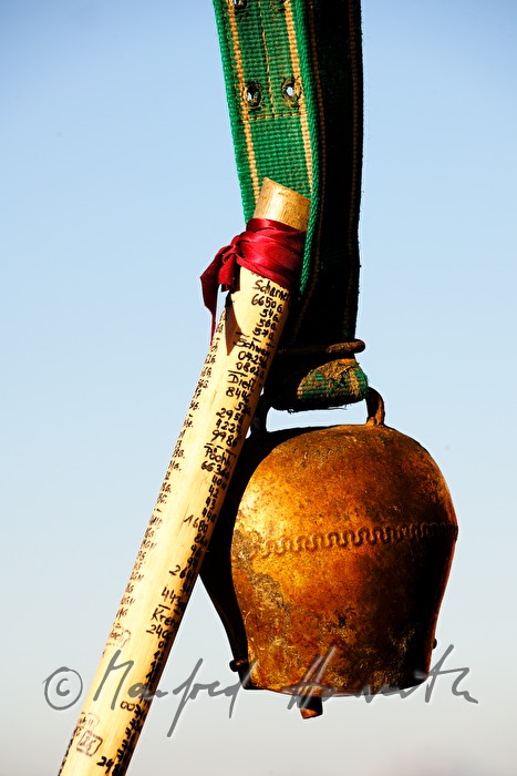 cowbell and hiking pole of the herdswoman