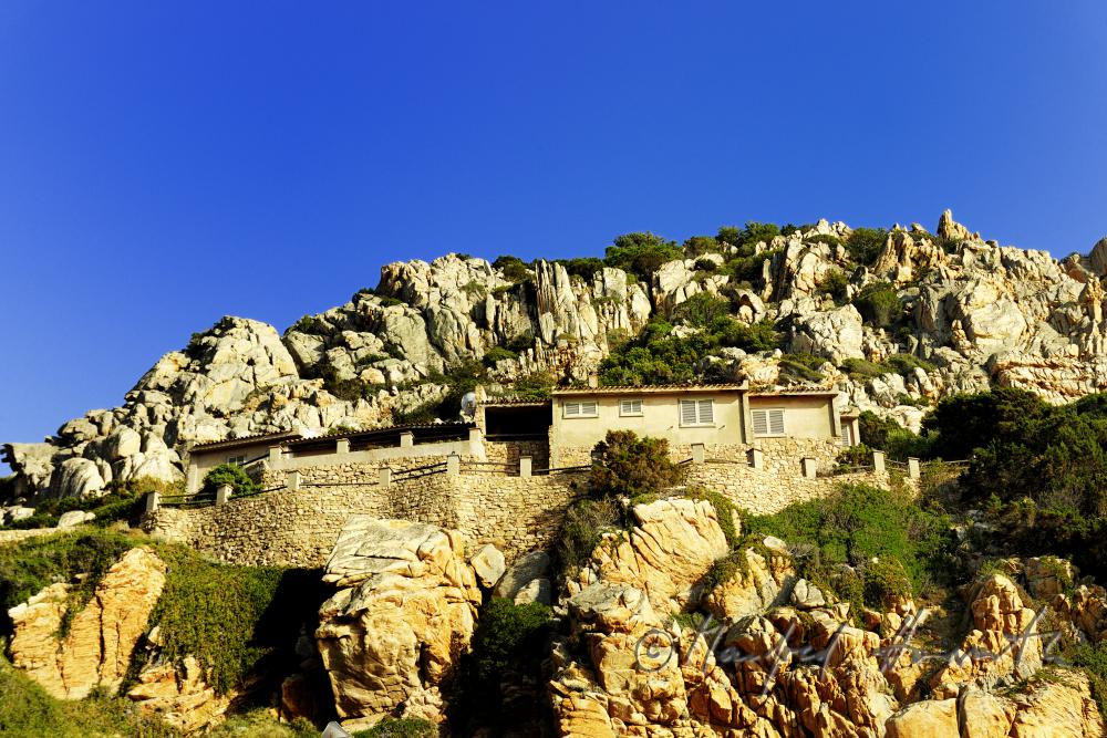 cottage in the steep granite cliffs