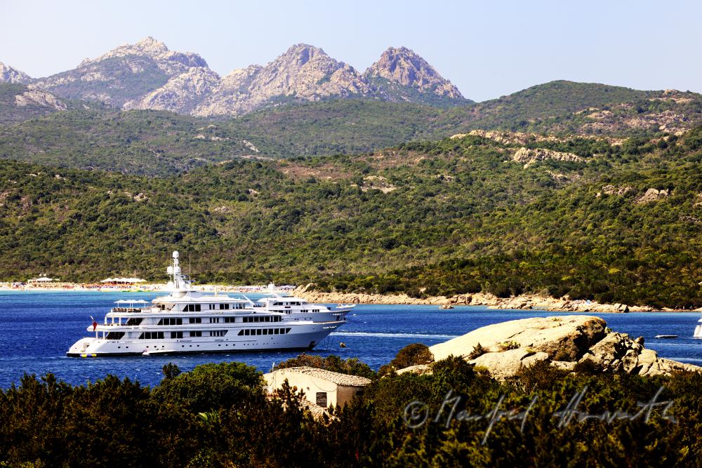 yacht and mountains of the granite formation