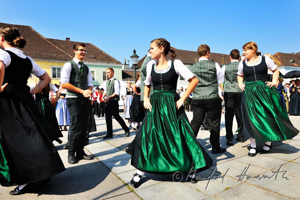 folk dance show after the mass on the church square