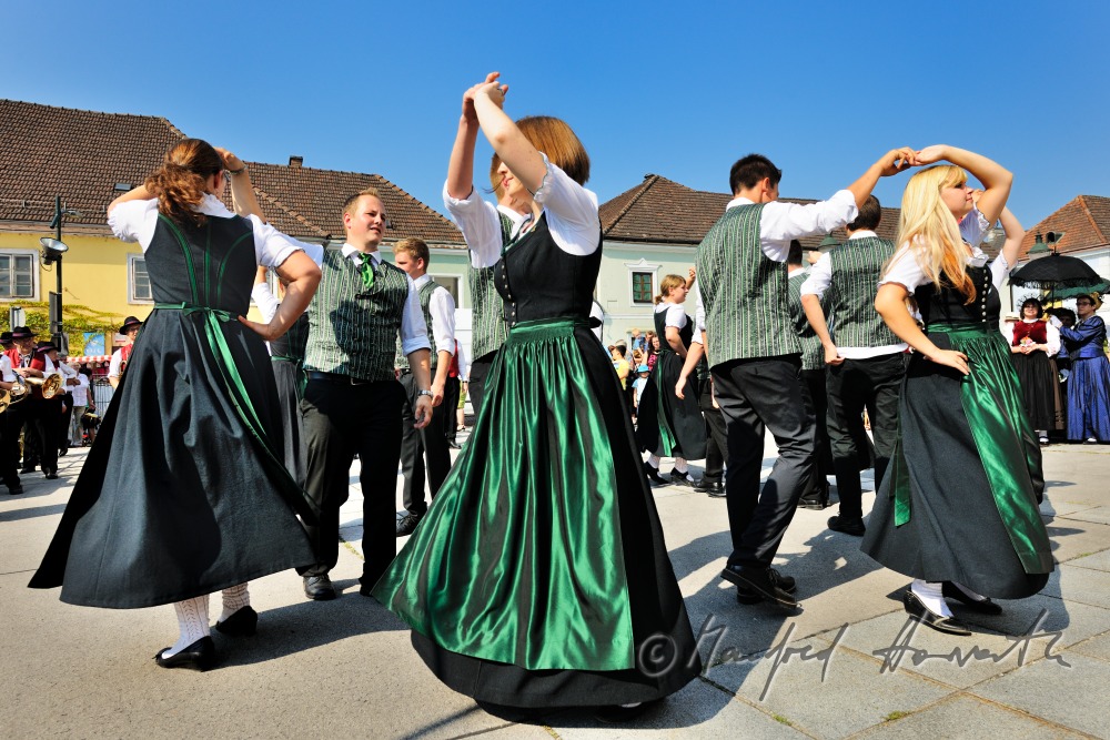 folk dance show after the mass on the church square