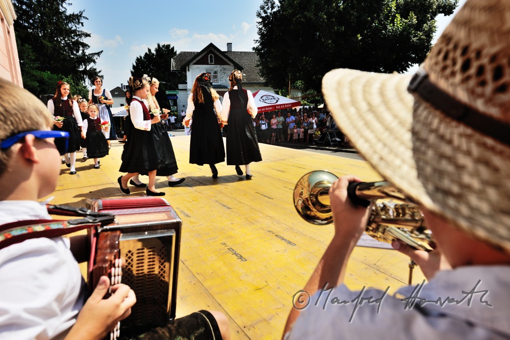 folk dance show after the mass on the church square