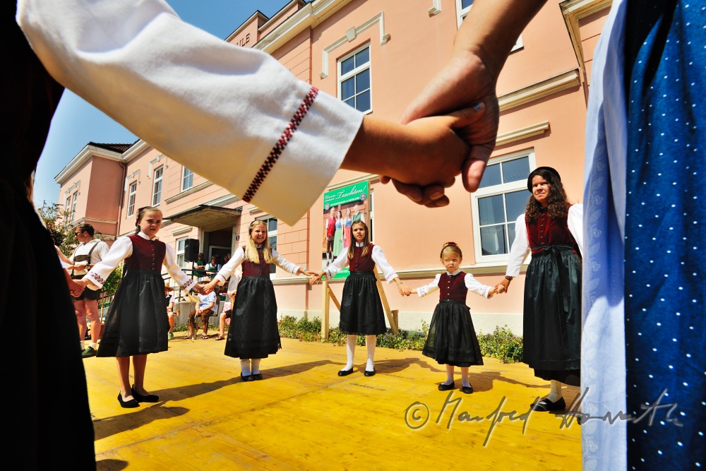 folk dance show after the mass on the church square
