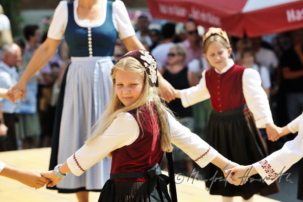 folk dance show after the mass on the church square