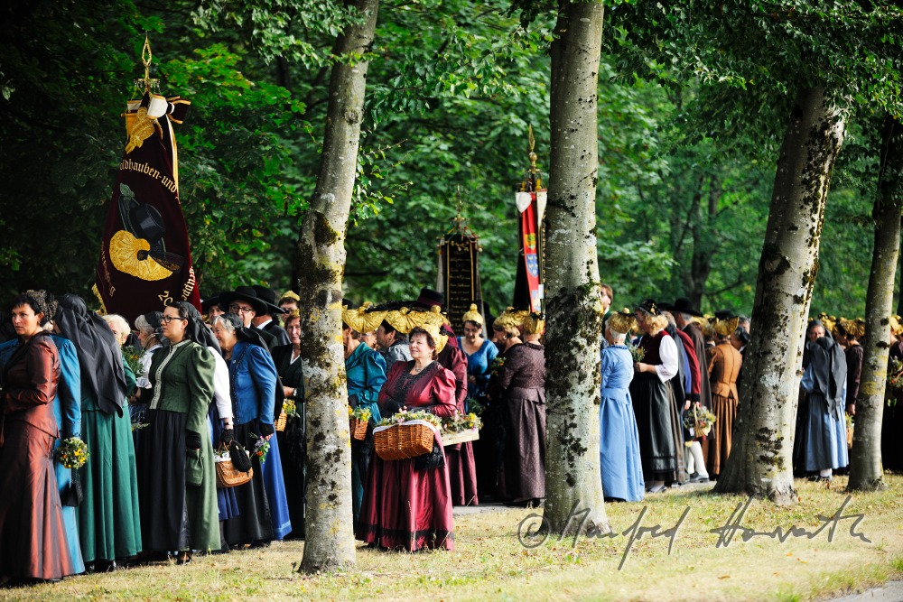 procession to the church in traditional clothes