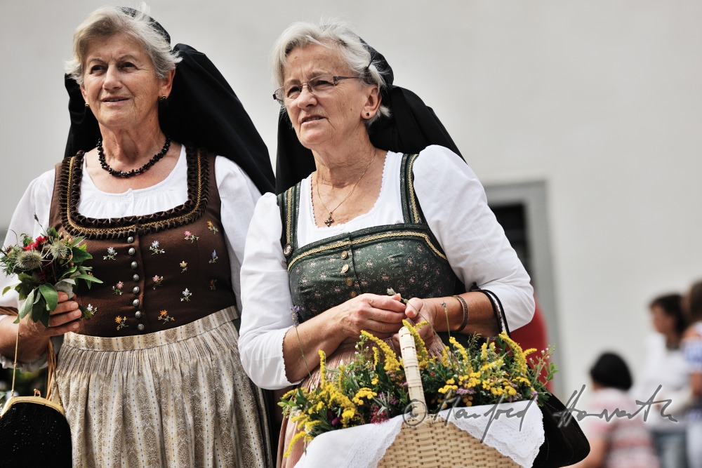 procession to the church in traditional clothes
