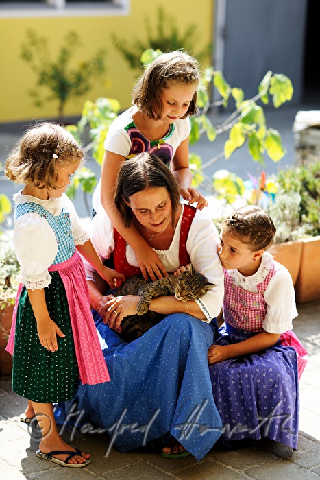 mother and her three daughters and cat