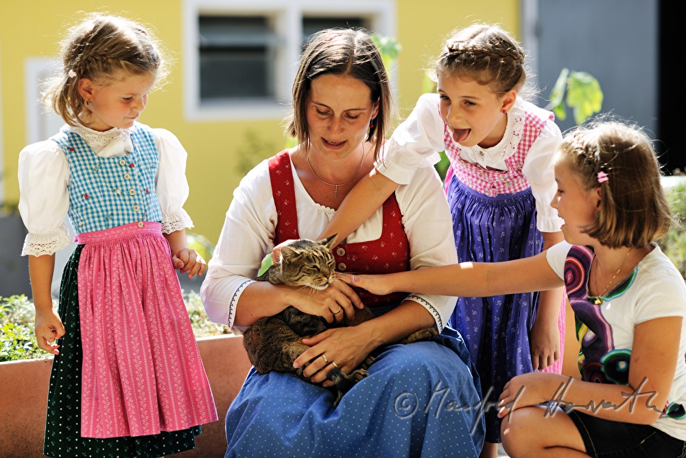 mother and her three daughters and cat