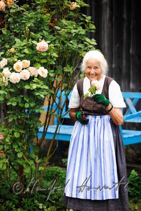 Mrs Ingolde Fuchs working in her garden