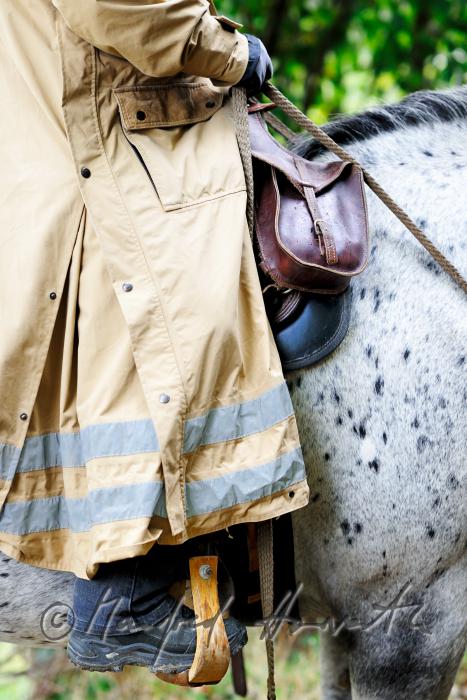 raincoat of a rider in bad weather