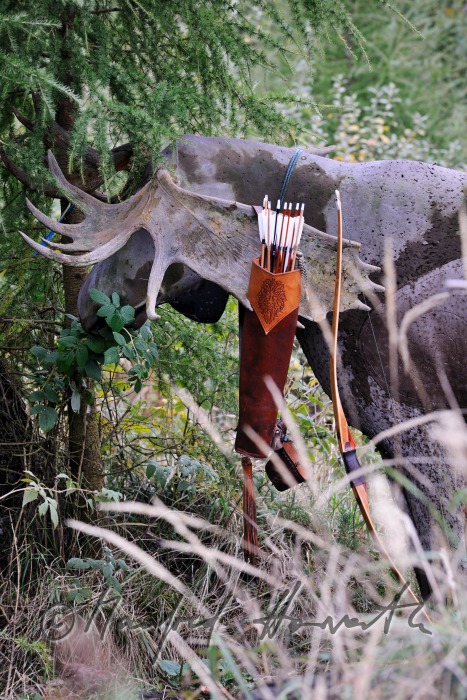 quiver with arrows on the horns of a fake elk