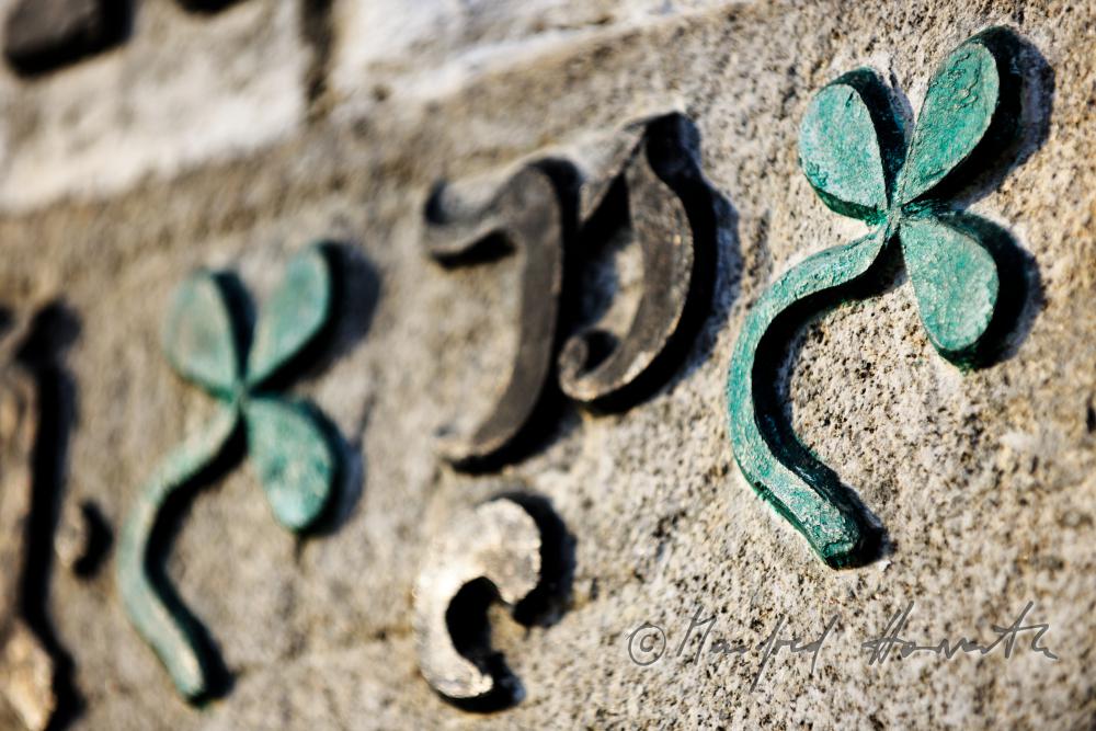 inscription made of iron on the lintel of the farmhouse