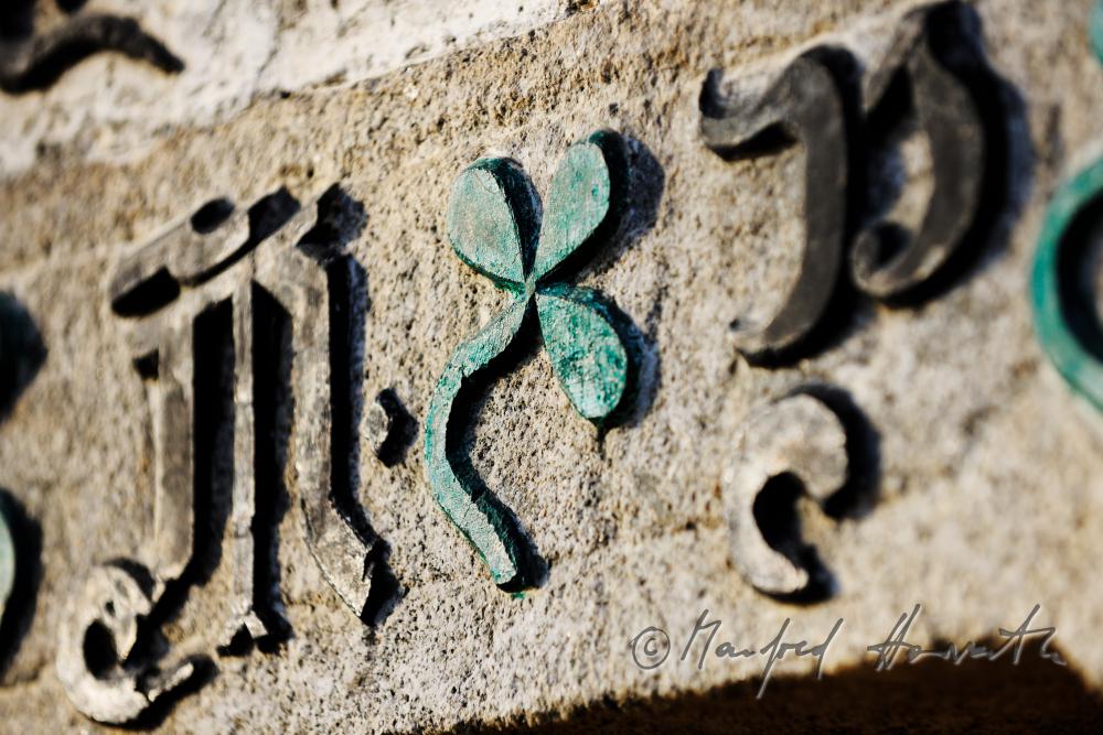 inscription made of iron on the lintel of the farmhouse