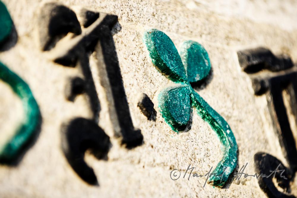 inscription made of iron on the lintel of the farmhouse