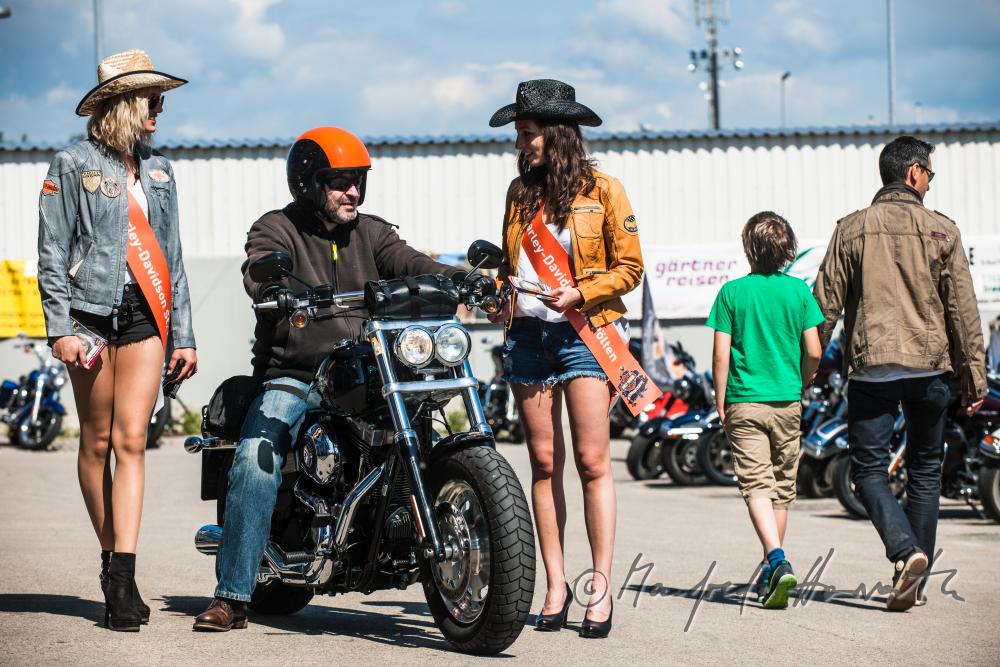 Harley Davidson meeting on a parking lot near the store