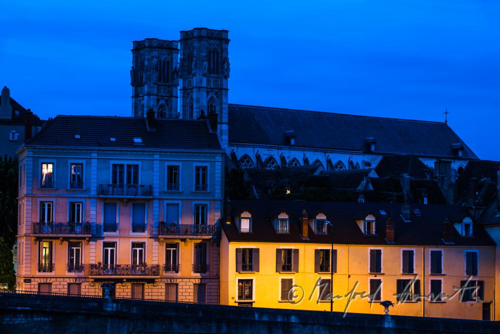 cathedral St. Vincent and column of the bridge over the river Saone