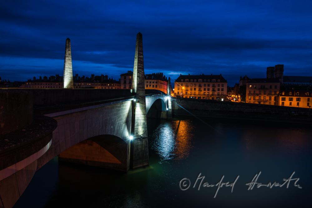 cathedral St. Vincent and column of the bridge over the river Saone
