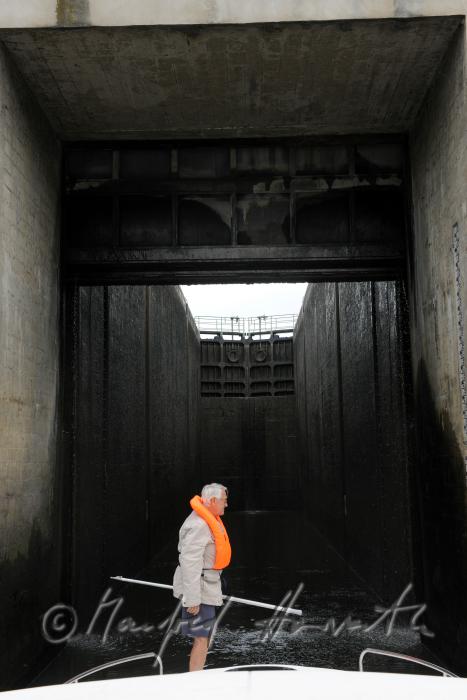 house boat entering an eleven meter high flood gate