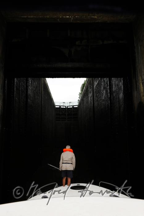 house boat entering an eleven meter high flood gate