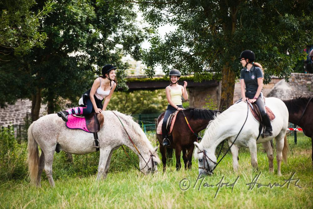 riders near the rivershore