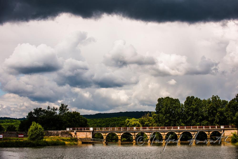 arch bridge over the River La Seille