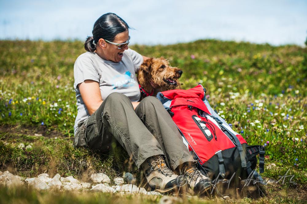 hiker with her dog on the high route