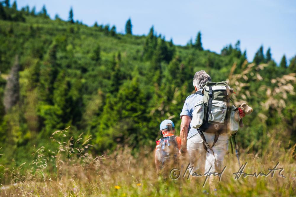 granny and grandchild hiking on the high route