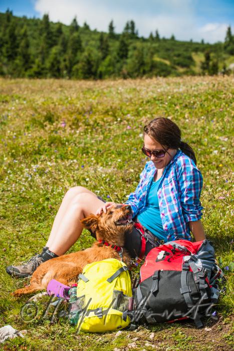 hiker with her dog on the high route