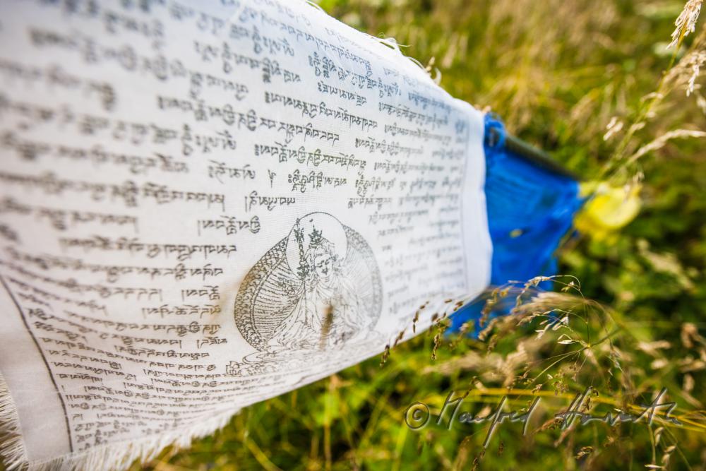 Tibetan prayer flags of the alpine hut 