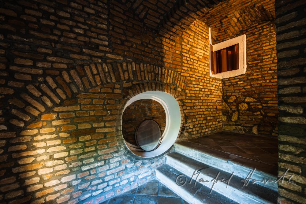staircase with a sculpture made of copper