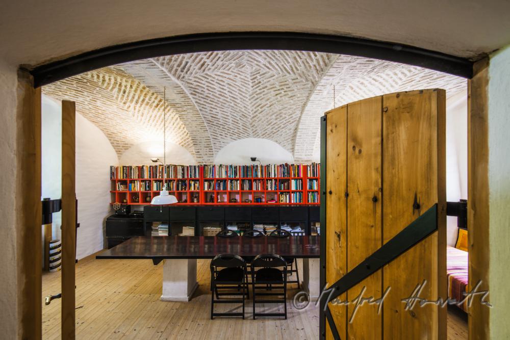 library and study in the arched room
