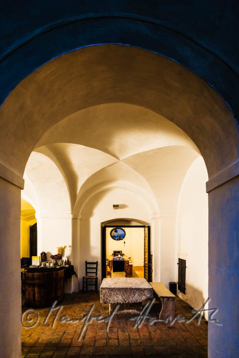 stone table and view into the dining room