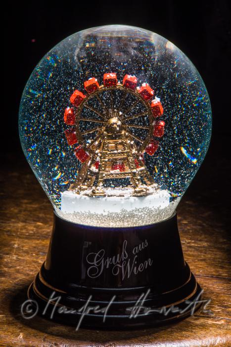 miniature Riesenrad (giant wheel) in a snow globe
