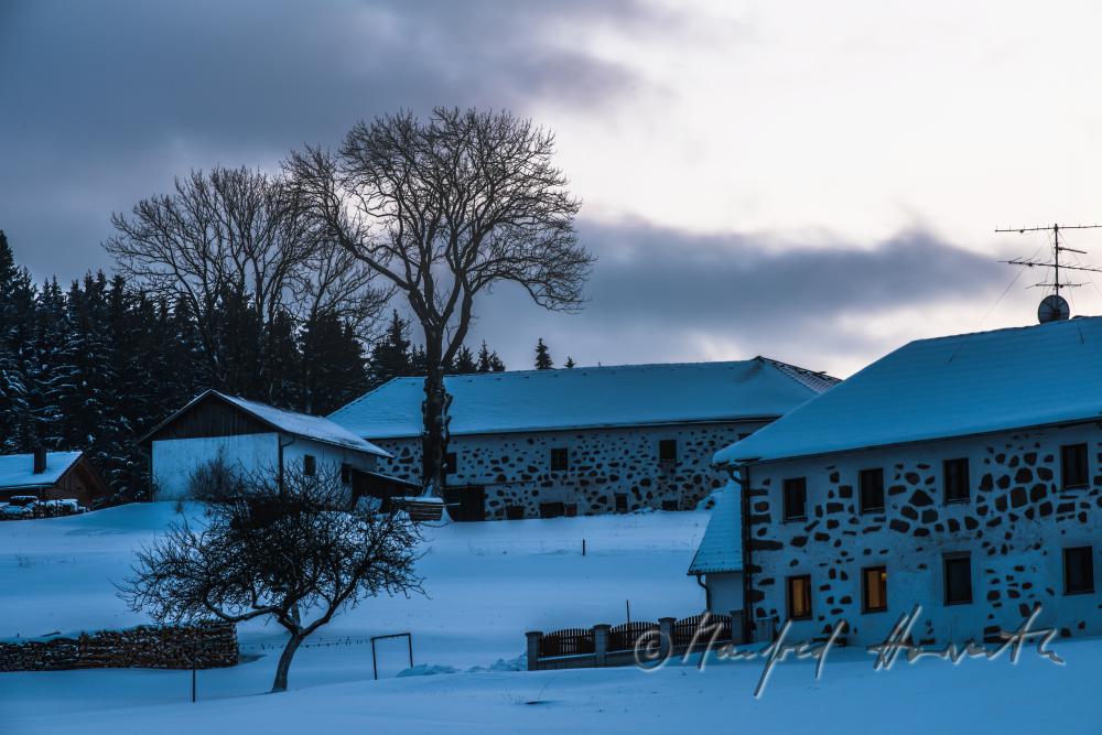 fassade of a typical farmhouse built of granite