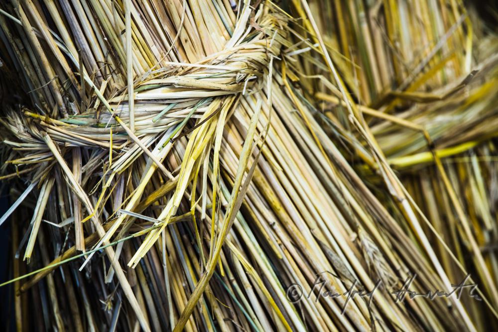 braided bundles of straw in the workshop of the basket braider