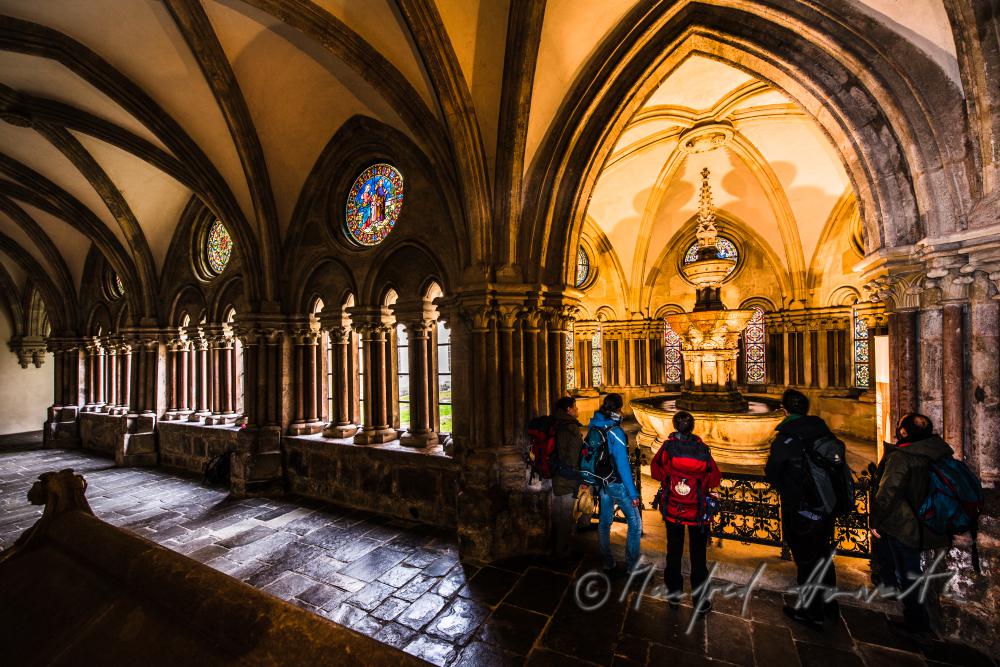 pilgrims in the lavatorium of the cloister