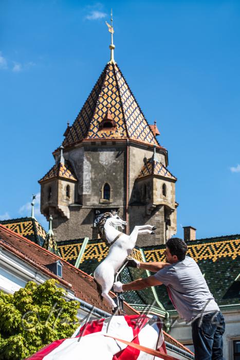building up a merry-go-around on the main square