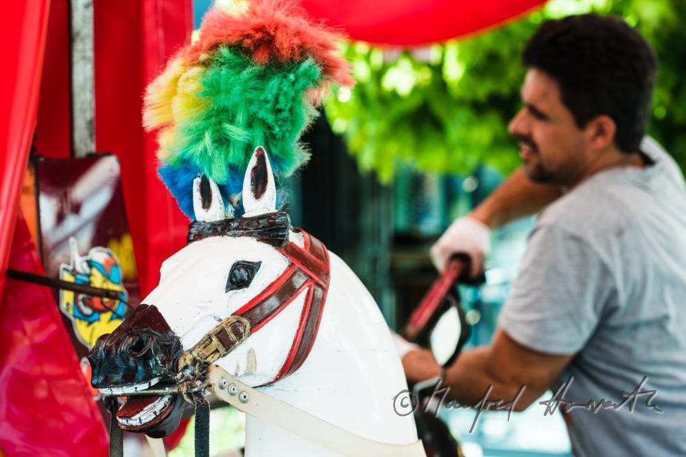 building up a merry-go-around on the main square