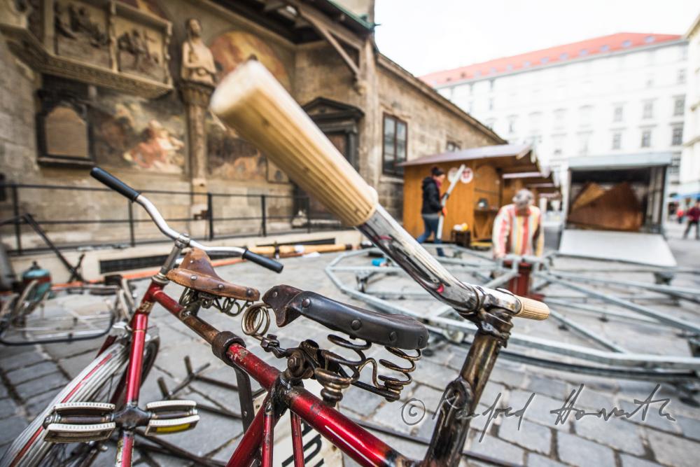 building up a merry-go-around made of recycling parts