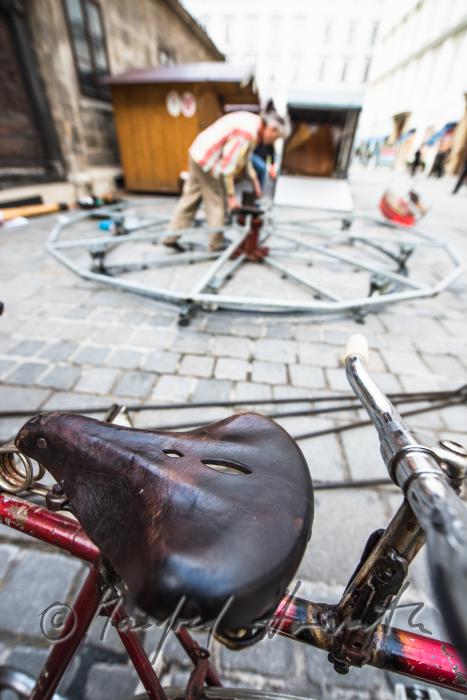 building up a merry-go-around made of recycling parts