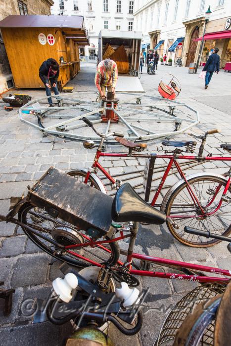 building up a merry-go-around made of recycling parts
