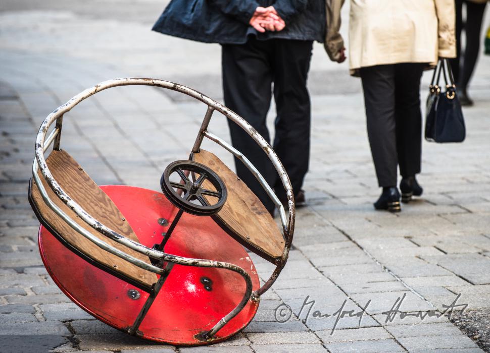 building up a merry-go-around made of recycling parts