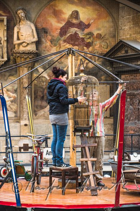 building up a merry-go-around made of recycling parts